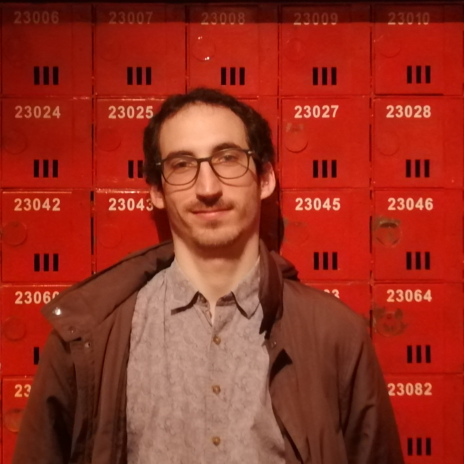 Josué Tonelli-Cueto in front of old postboxes in the Hong Kong Museum of History